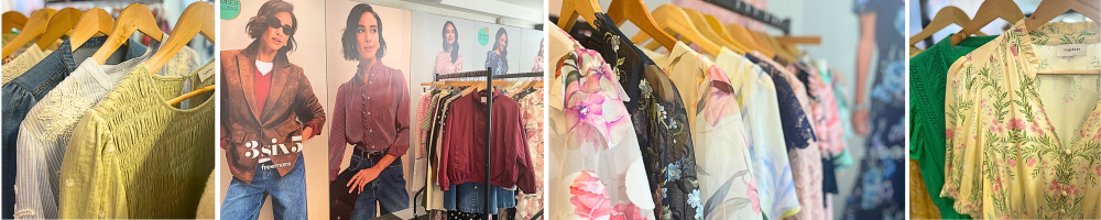 A display of various women's clothing including blouses, dresses, and jackets hanging on wooden hangers. Fashionable mannequins are featured in the background. The color palette includes greens, golds, and floral patterns.